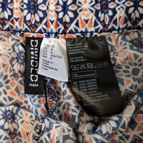 Divided H&M printed pull on shorts with pompom trim Sz 8 - Picture 3 of 5